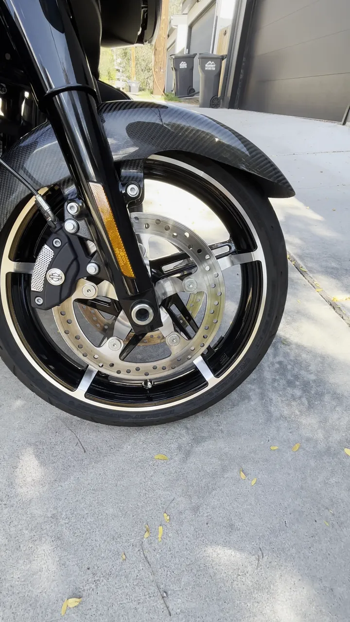 Black bagger saddlebag and rear end after a full motorcycle detail
