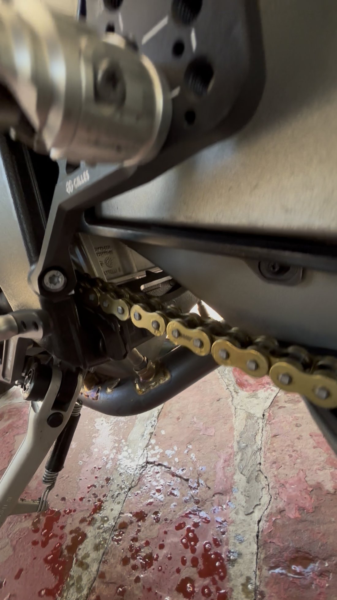 BMW S1000RR chain and swingarm close-up