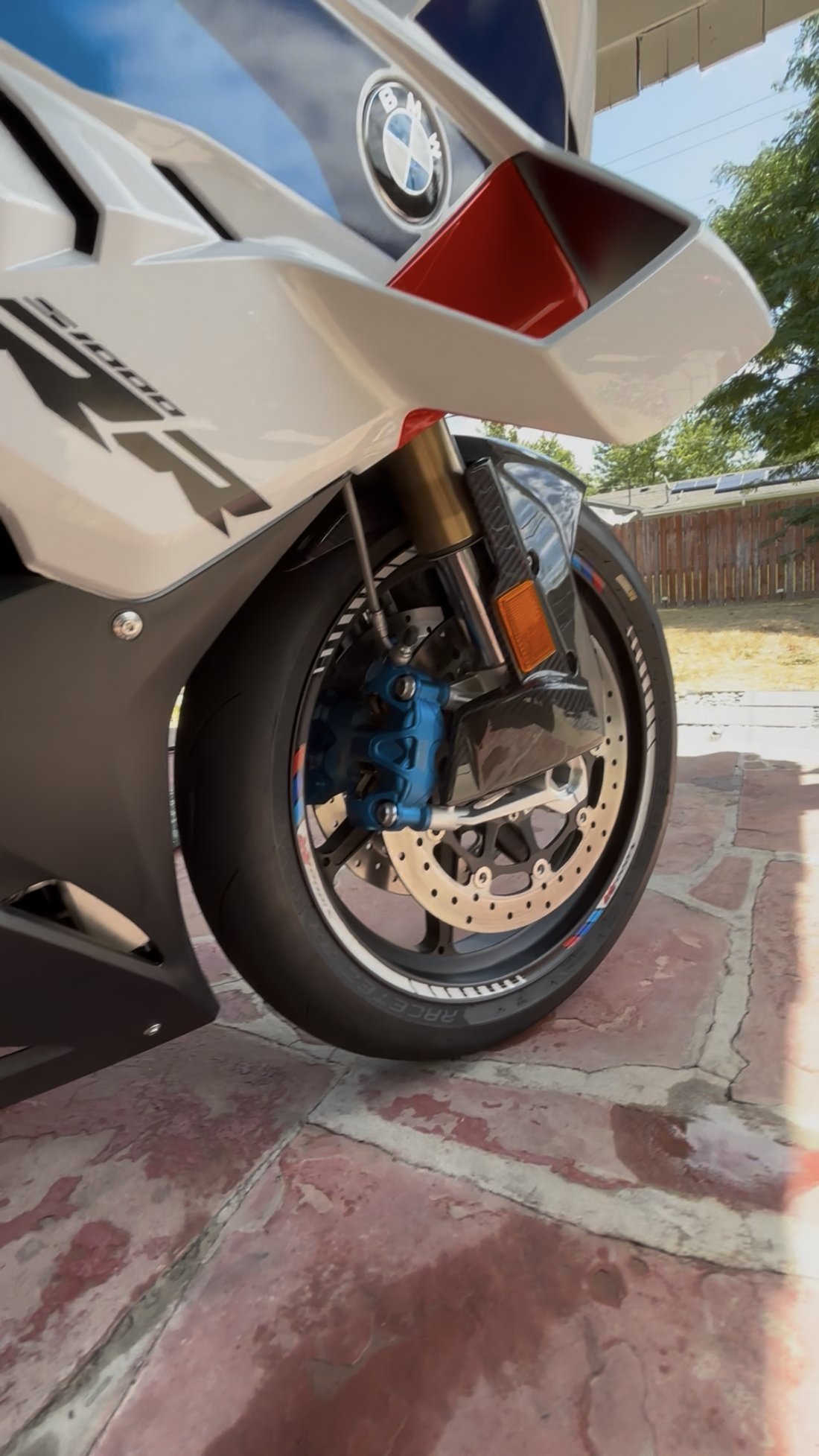 BMW S1000RR front wheel and badge close-up