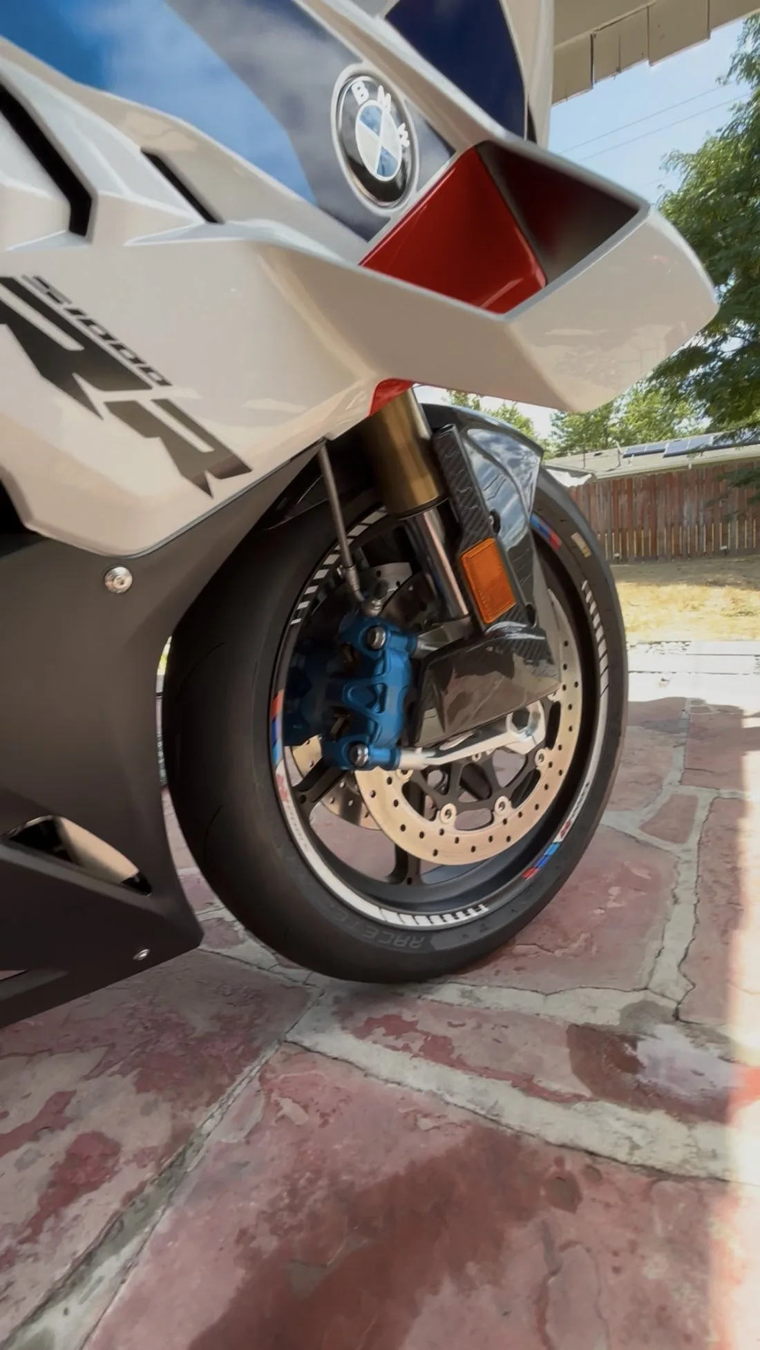 BMW S1000RR front wheel and badge close-up