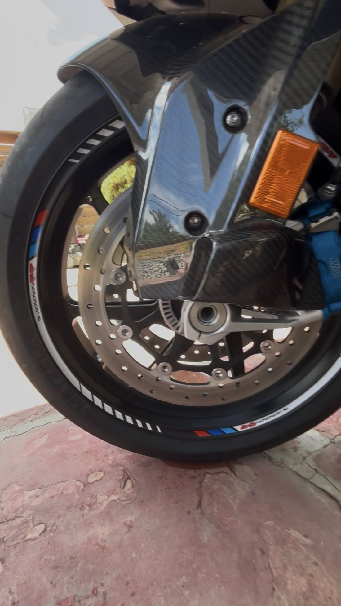 BMW S1000RR front wheel and carbon fender close-up