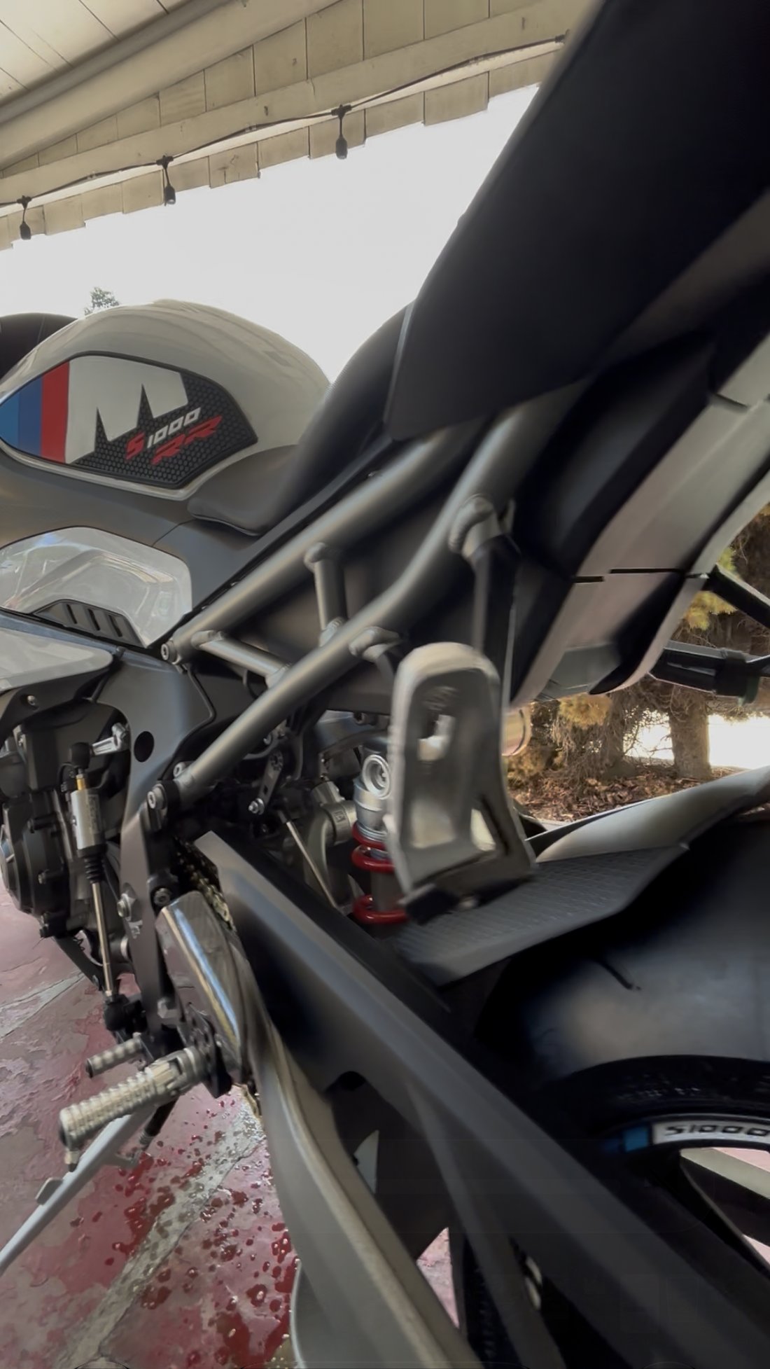 BMW S1000RR rear shock and tail close-up