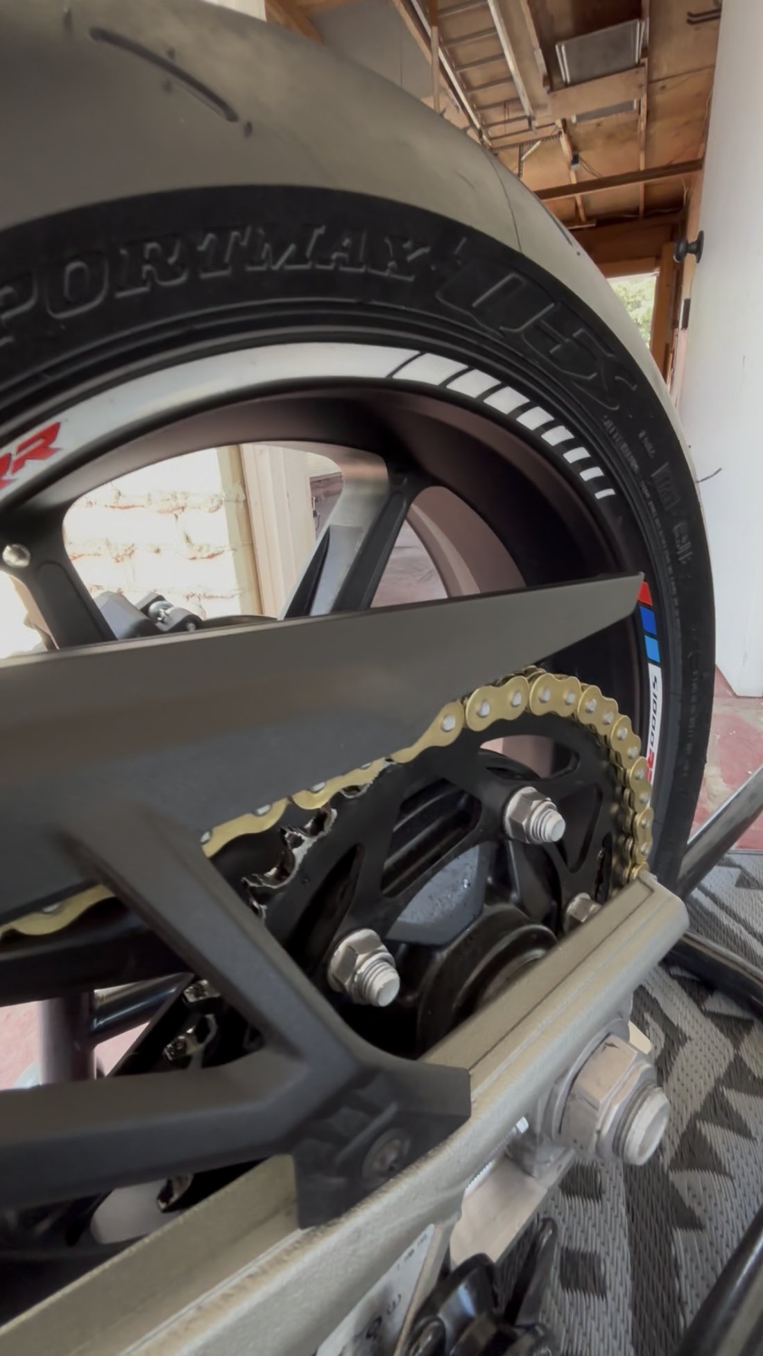 BMW S1000RR rear wheel and chain close-up