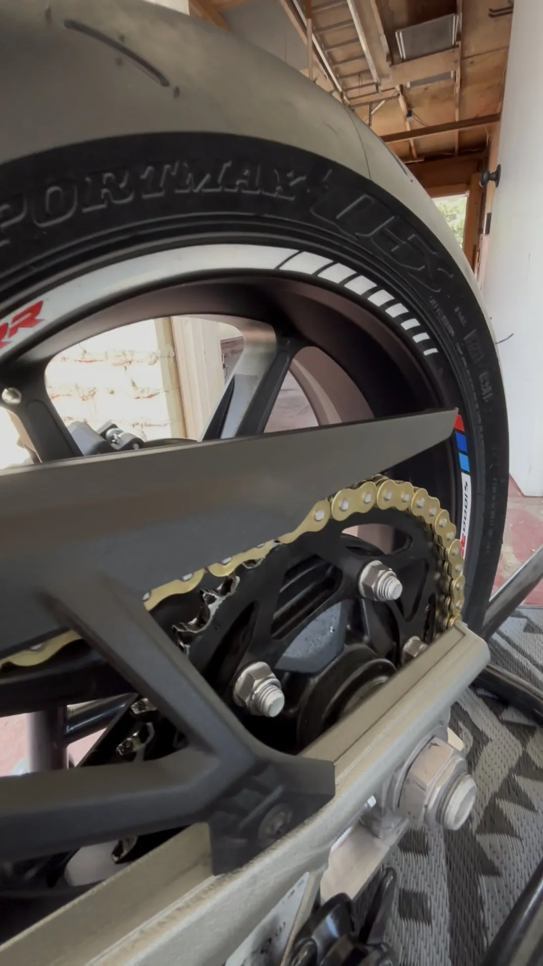BMW S1000RR rear wheel and chain close-up