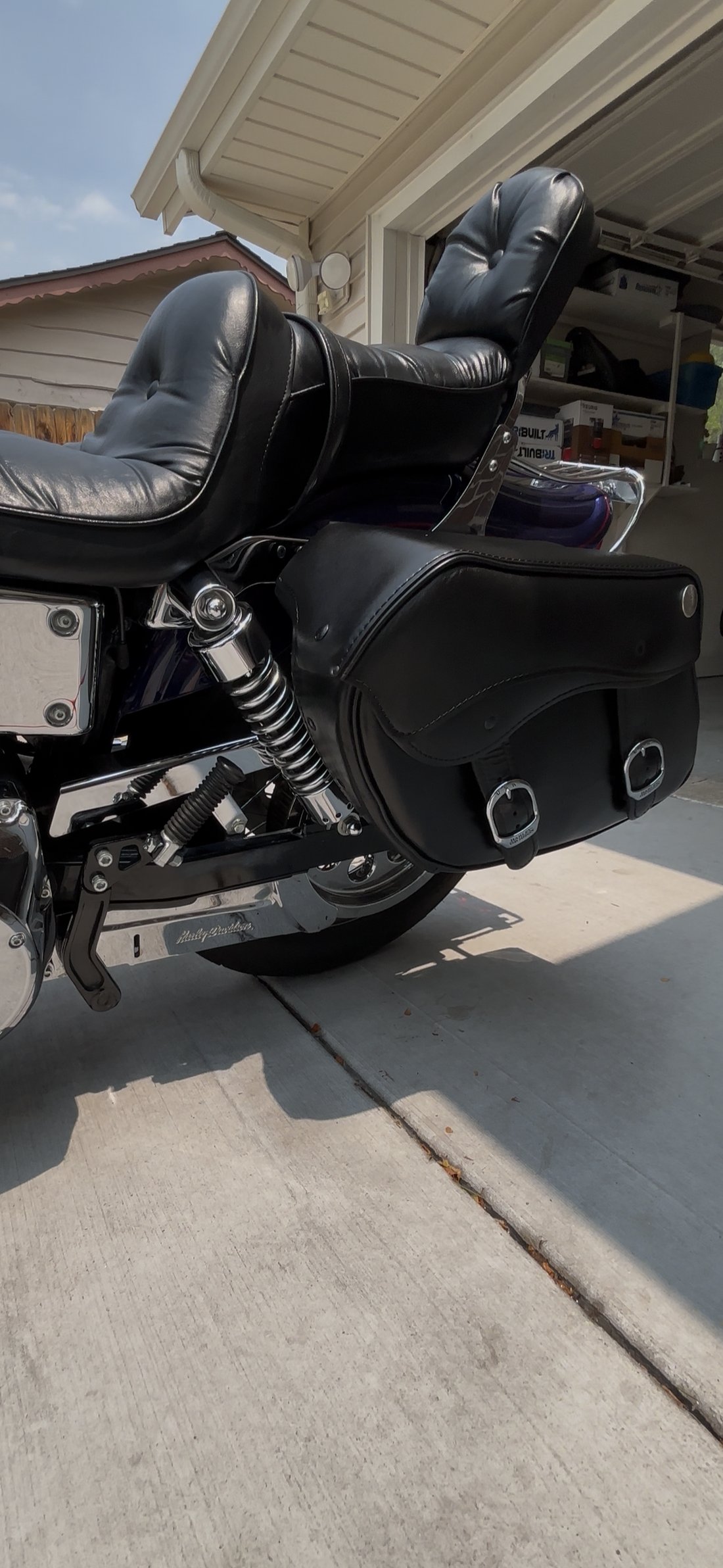Harley saddlebag and rear suspension close-up