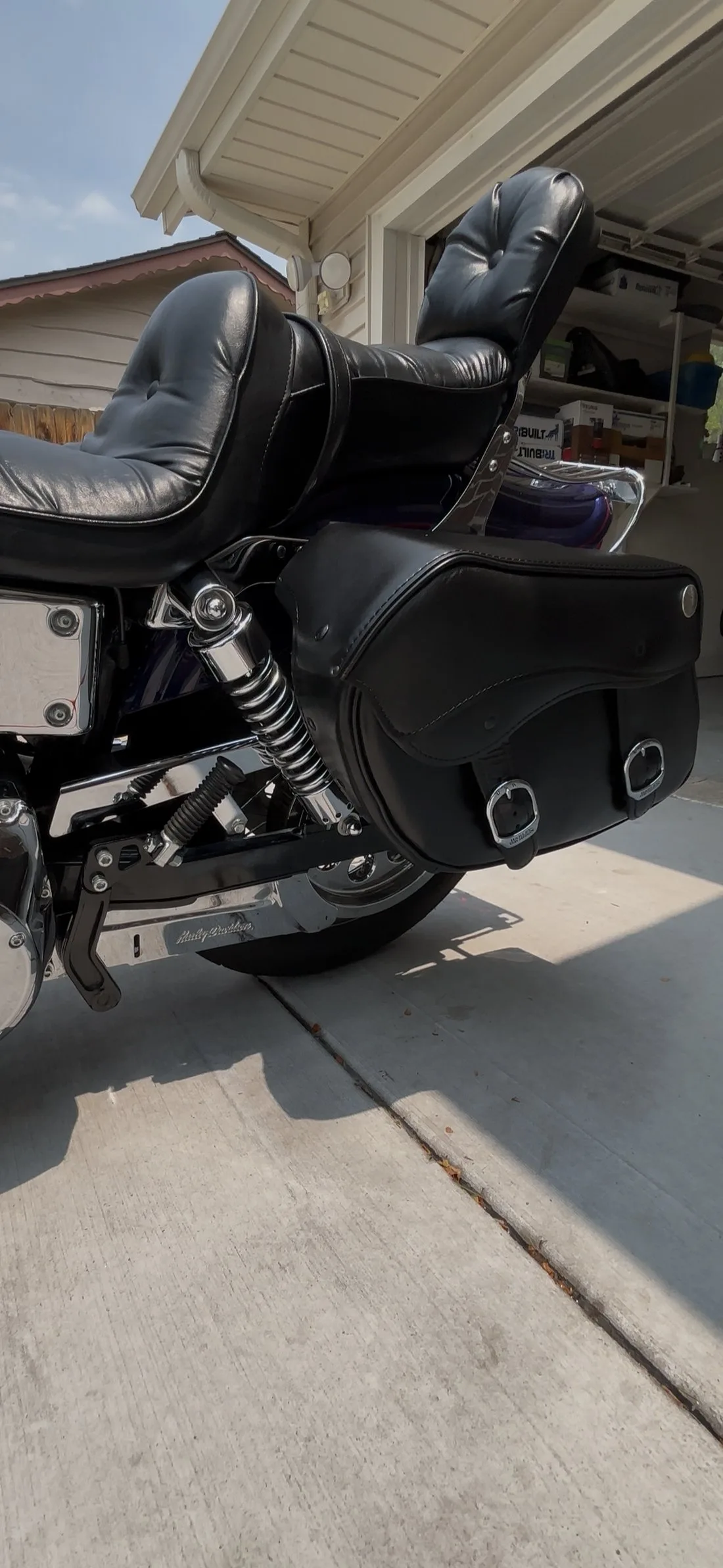 Harley saddlebag and rear suspension close-up