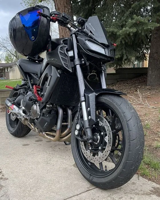 Black naked streetfighter motorcycle after mobile detail in the Denver metro