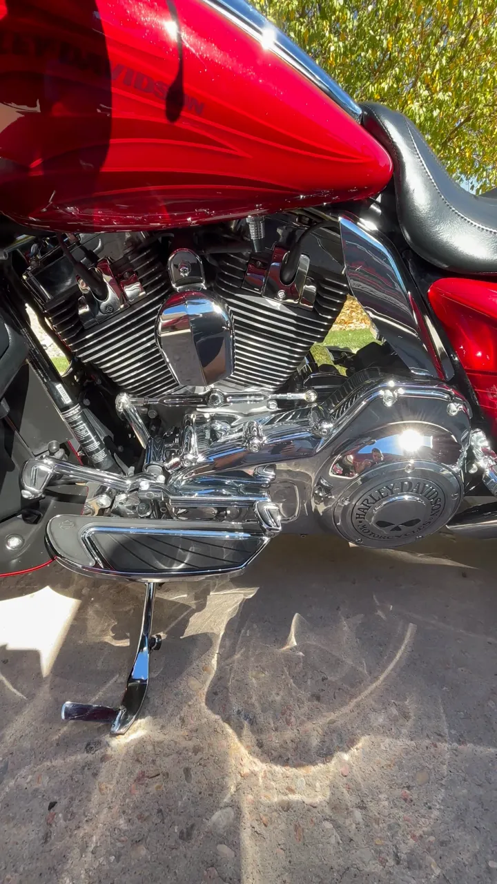 Red bagger engine and chrome after a full motorcycle detail